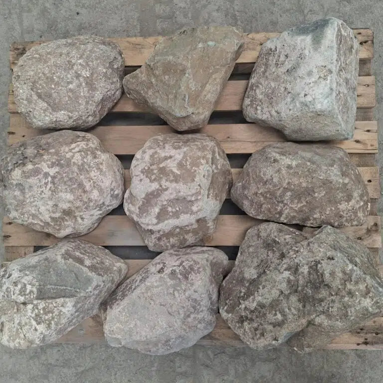 Glacial boulders seen from above, showing irregular shapes and natural colour variation