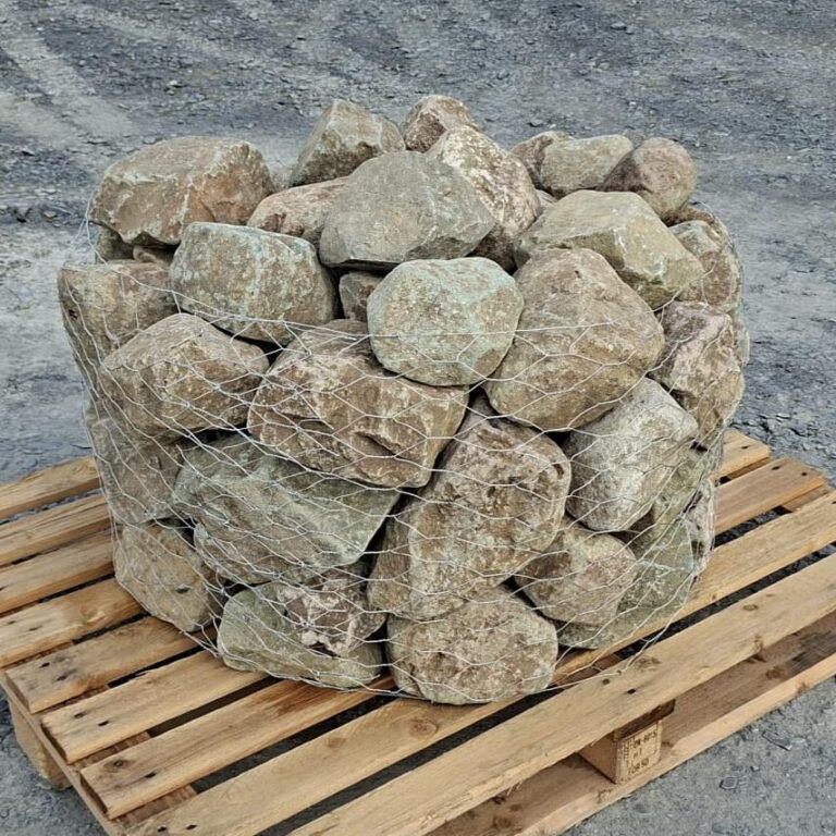 Pallet of glacial stones showing rounded shapes and greenish grey faces