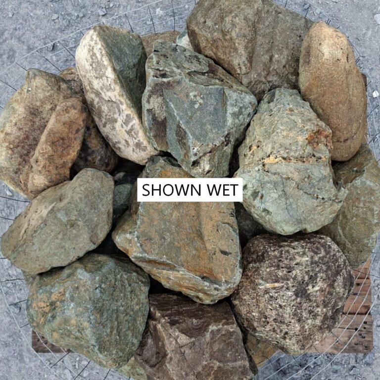 Wet glacial stones seen from above, showing green, ochre and brown markings