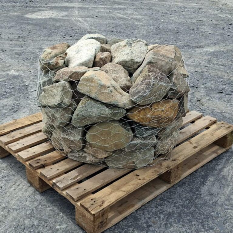 Caged mixed glacial stones showing angular and rounded shapes