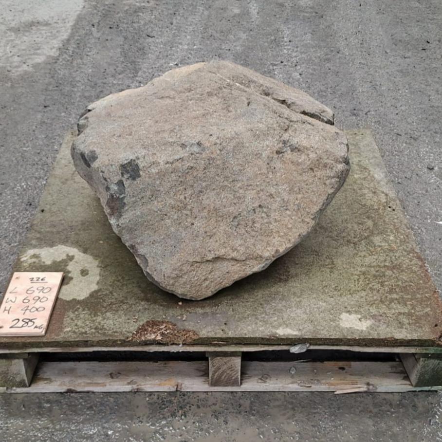 Garden stone boulder with natural texture and colour tones displayed on a pallet.