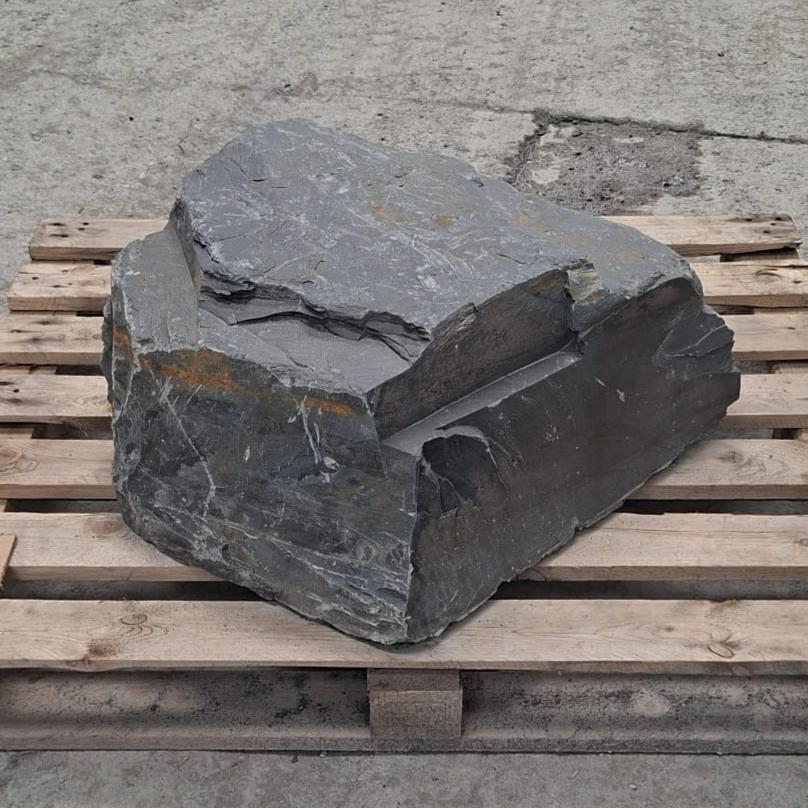 Angular Welsh slate boulder with stepped layers on a wooden pallet