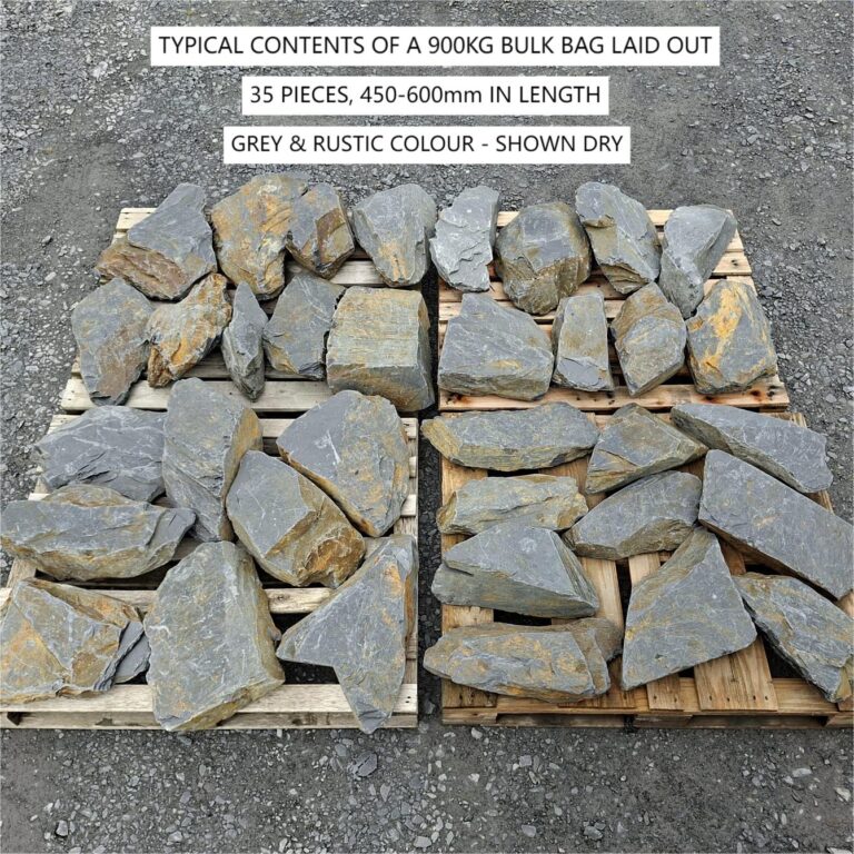 Large dry slate stones laid out across pallets to show typical bulk bag contents