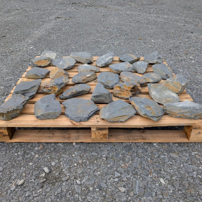 Single layer of mini slate stones spread across a pallet