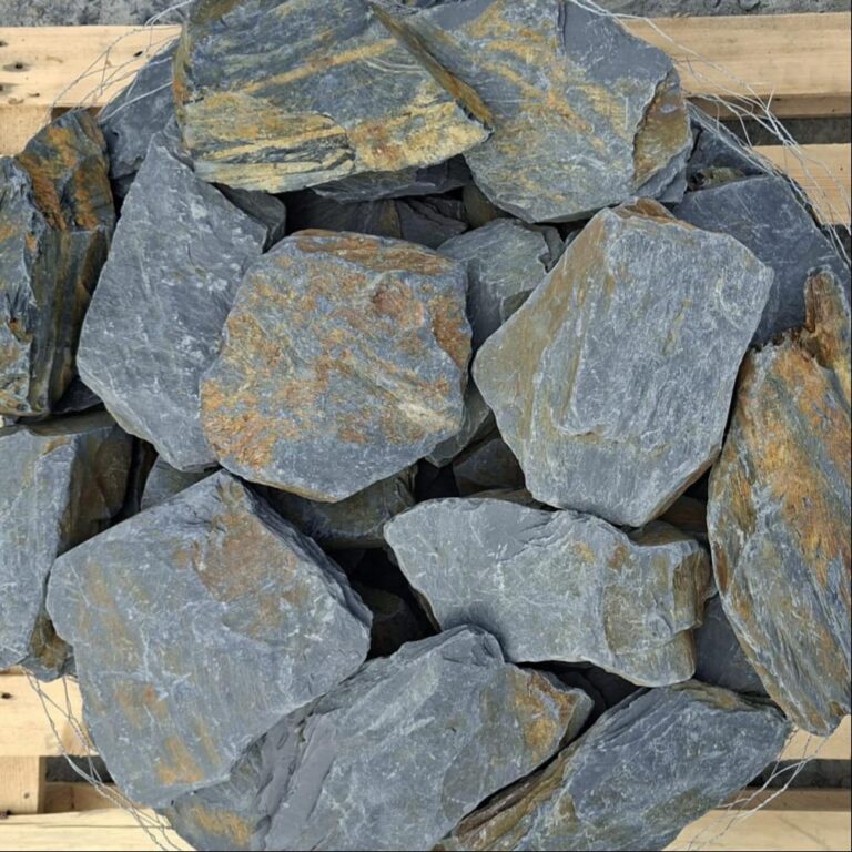 Welsh slate stones photographed from above, showing grey and rusty brown variation
